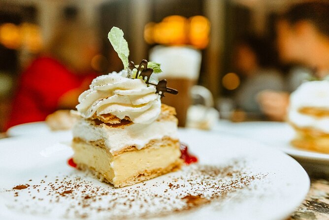 Award-Winning Prague Evening Old Town Food and Drink Tour - Crossing toward Mala Strana