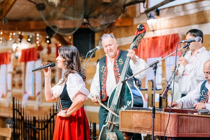 Folk Dinner Experience in Prague with Transportation - Music, costumes, and joining the Czech dances