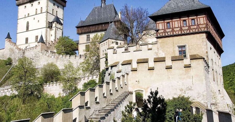 From Prague: Half-Day Karlstejn Castle Tour - Walking up to the castle