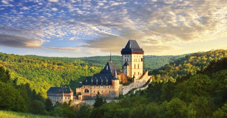 From Prague: Karlštejn Castle & Koněprusy Caves Tour - Transport, timing, and group size