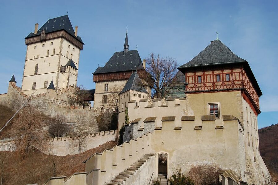 From Prague: Karlstejn Castle Skip-the-Line Ticket and Tour - The uphill approach and the small town below