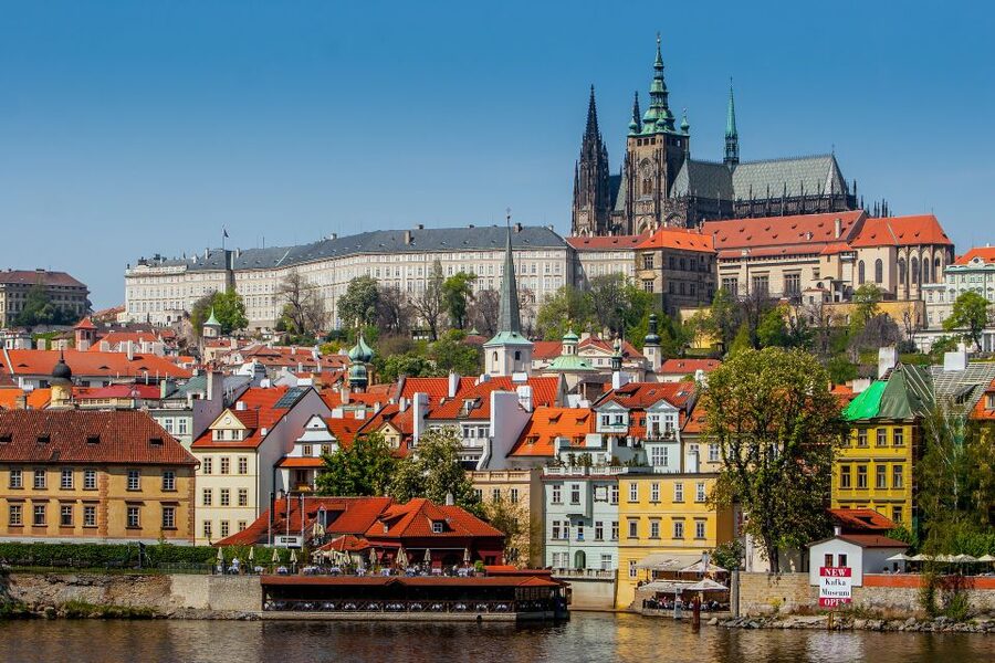 Full Day Private Tour Through Prague - Crossing medieval Charles Bridge