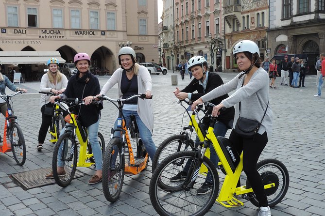 Grand City Tour of Prague on Cruiser e-Bikes or e-Scooters - Kampa Park, Lennon Wall, and Charles Bridge