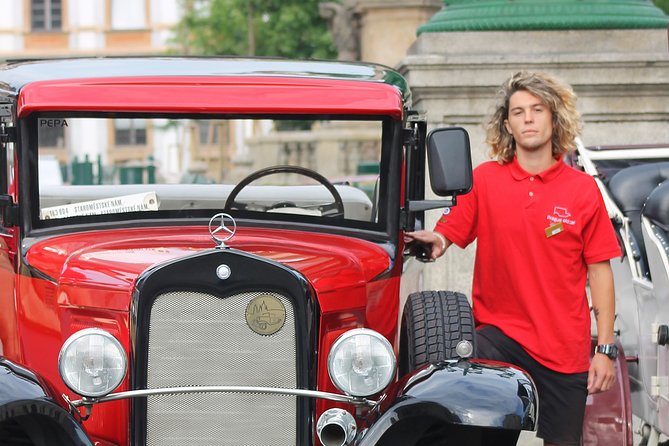 Kutná Hora Medieval Town in Vintage Cabrio car - Jesuit College Park gives the day some breathing room