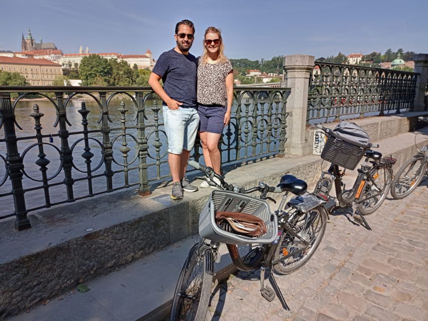 Prague: 3–Hour Communism and World War 2 E-Bike Tour - John Lennon Wall and the Kafka Museum area