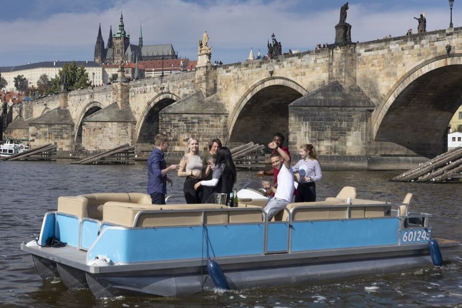 Prague: Beer Boat Tour - A private beer boat with Prague as the backdrop