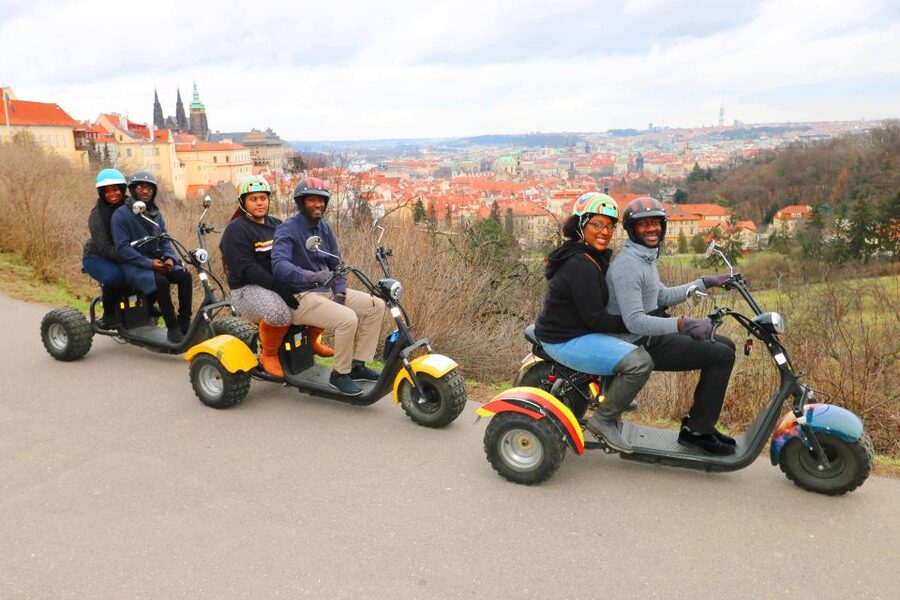 Prague: City Highlights Guided Electric Trike Tour - Crossing Lesser Town and the riverfront