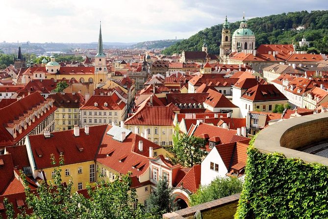Prague City Highlights Private Tour for Kids and Families - Walking downhill through Prague’s cinematic streets