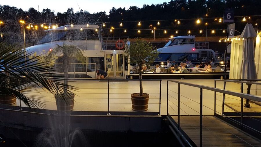 Prague: City Tour and Dinner Cruise with Hotel Pickup - Prague’s floodlit sights from the river