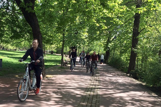Prague E-Bike Tour - Stunning Viewpoints (small group) - Returning past the National Theater and Wenceslas Square
