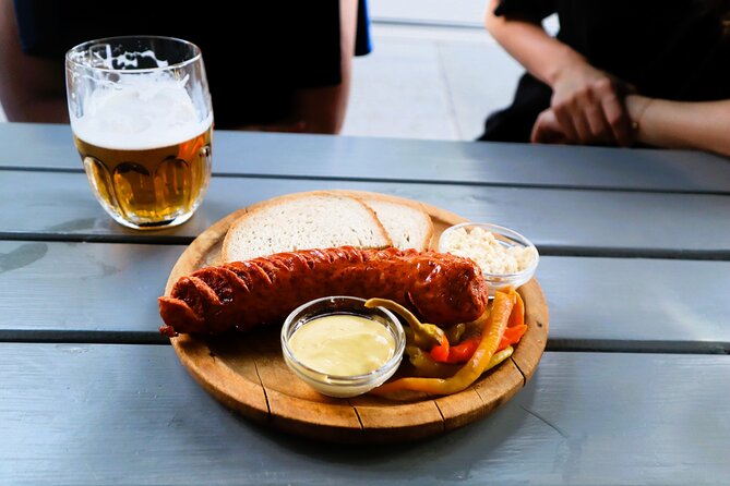 Prague Food tasting tour of Hidden Gems for Small Groups - Klobása and Czech beer bring the pub atmosphere