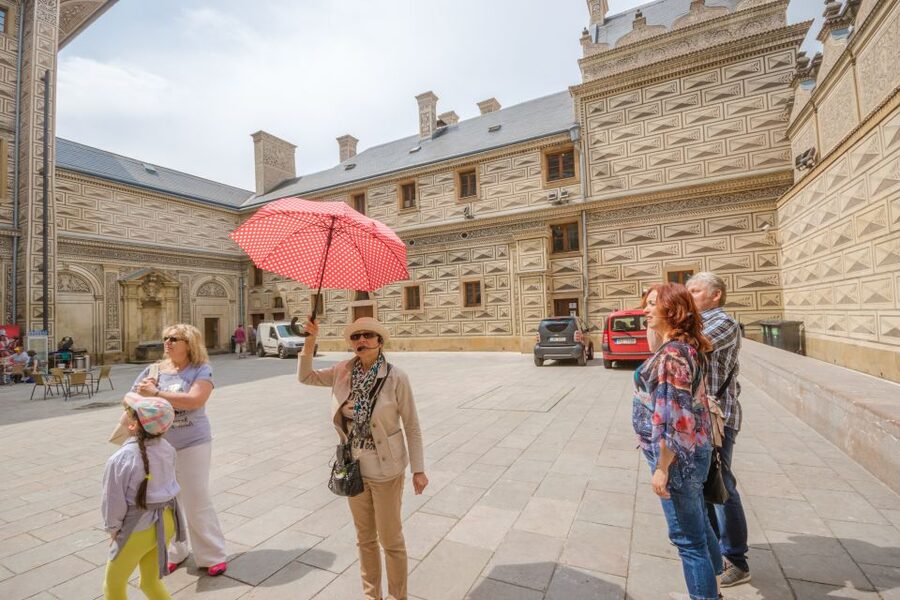 Prague: Guided Bus & Walking Tour with River Cruise & Lunch - Hotel pickup, meeting point, and the return trip