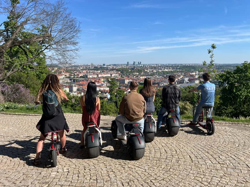 Prague Highlights: Segway & E-Scooter Tour with Taxi Pick-Up - John Lennon Wall, Charles Bridge, and the National Theatre