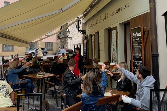 Prague Historic Pub Tour with Drinks Included - Timing, weather, and cancellation details