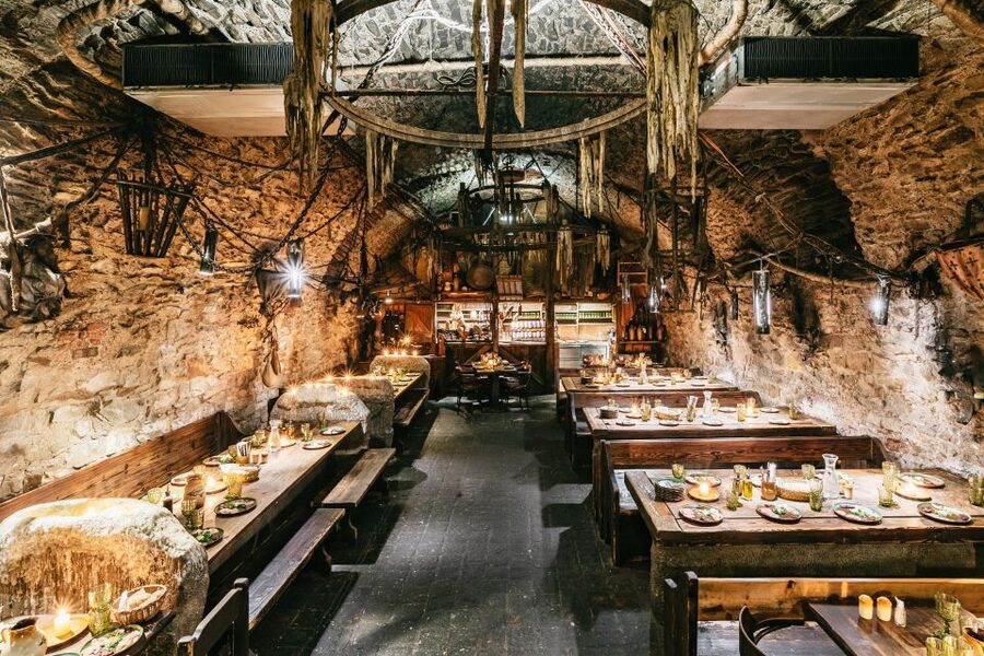Prague: Medieval Dinner with Unlimited Drinks - Entering U Pavouka’s medieval tavern