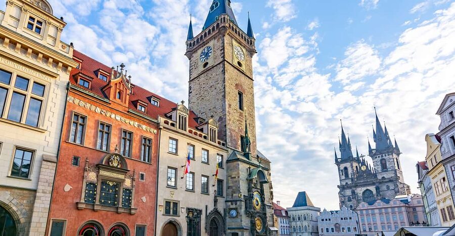 Prague: Old Town Guided Walking Tour and City Boat Ride - Starting at Cartier on Old Town Square