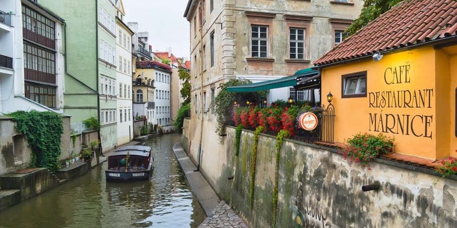 Prague: River Cruise, Charles Bridge Museum, & Walking Tour - Audio commentary, drinks, and the gingerbread break