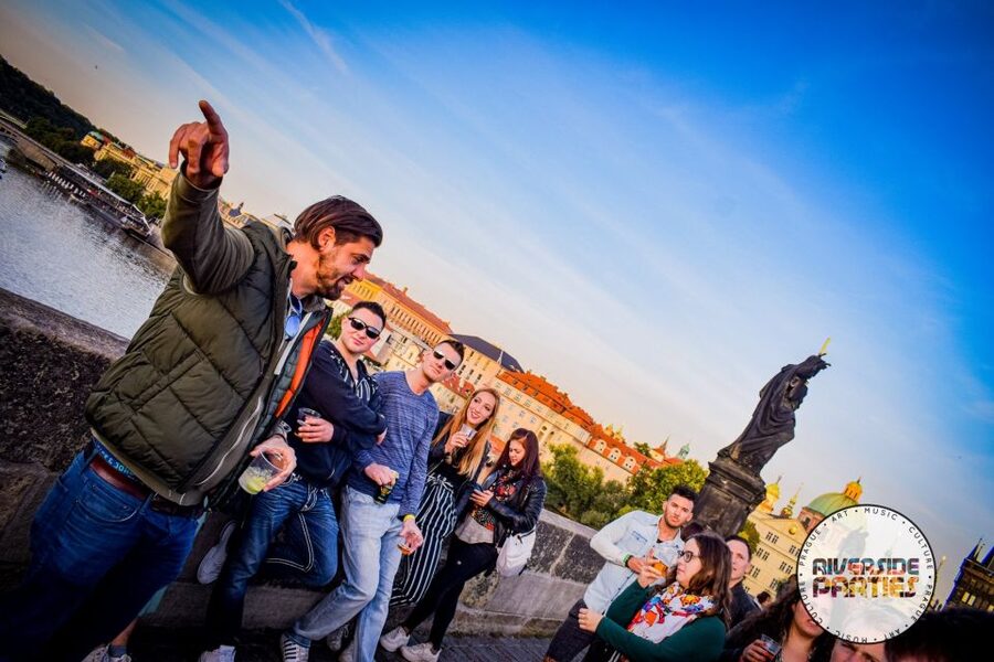 Prague Riverside Parties Tour - Crossing Charles Bridge with the night still going
