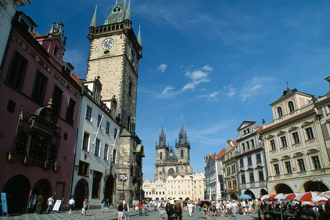 Prague´s Old Town, Jewish Quarter and Charles Bridge Private Tour - Crossing Charles Bridge toward the river