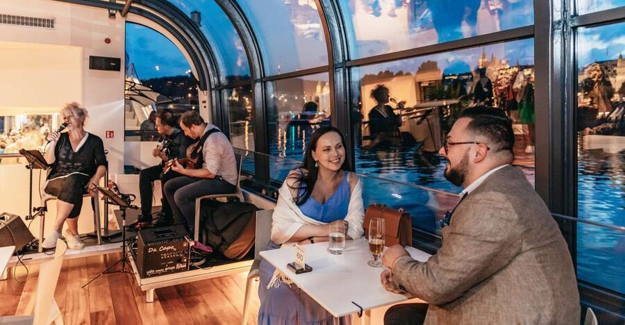 Prague: Sightseeing Dinner Cruise on Open-Top Glass Boat - Live music and the mood onboard