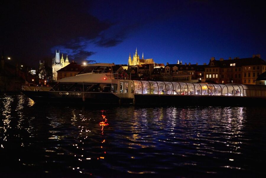 Prague: Sightseeing Dinner Cruise on Open-Top Glass Boat - Dinner while the city lights pass