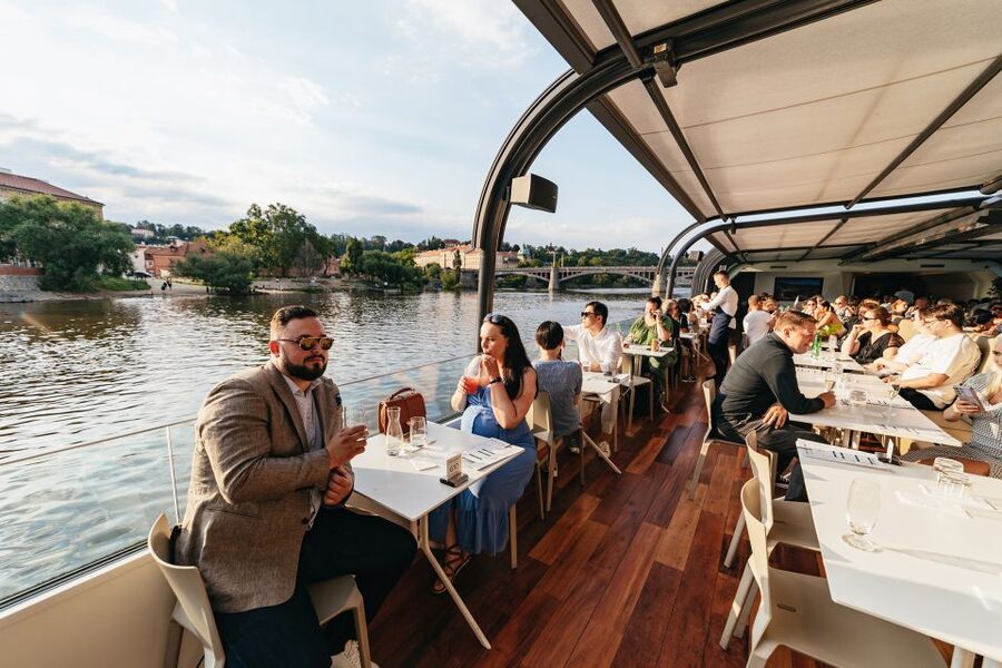 Prague: Sightseeing Dinner Cruise on Open-Top Glass Boat - Dancing House, Vyšehrad, and the changing river view