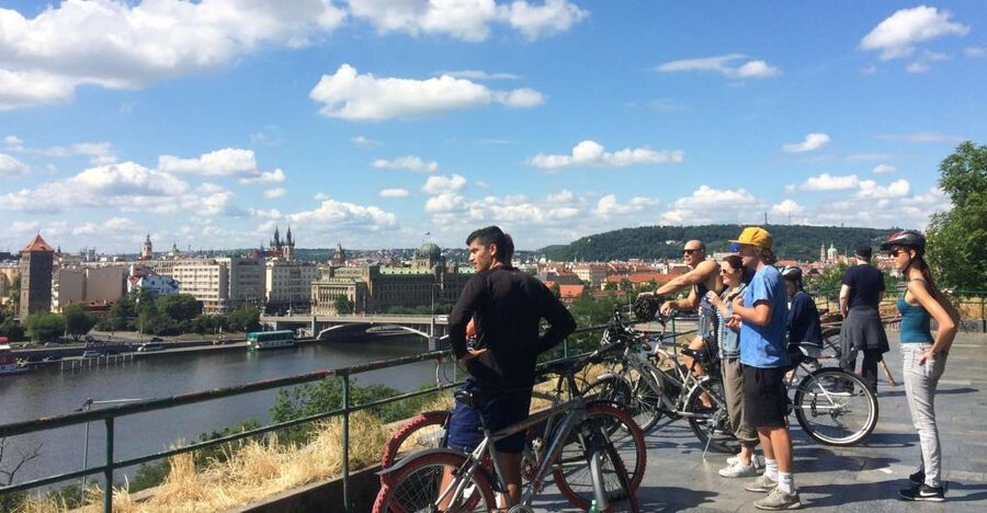 Prague: Stunning Viewpoints, Castle, City & Park Bike Tour - Crossing the Vltava near Hlávkův most