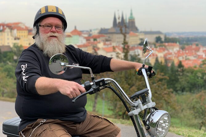 Prague Trike & e-Scooter Tour: Castle Viewpoints & Charles Bridge - The narrow street and Kafka’s playful statues