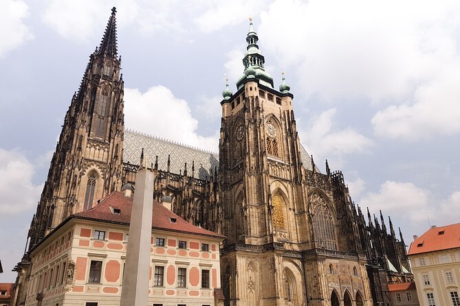 Prague Walking Tour with River Boat Cruise and Lunch - 6 hours - Taking the tram up to Hradčany