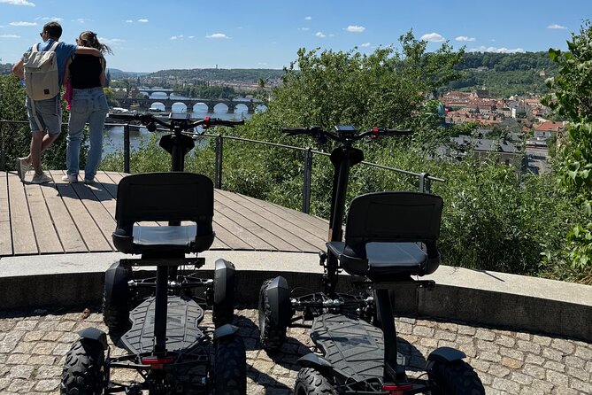 Scooter tours to Prague Castle and views. - The Lennon Wall as an optional final stop